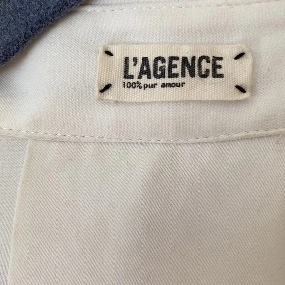 L’ Agence long sleeve blouse button down white black zip pockets needs cleaning - Picture 2 of 7
